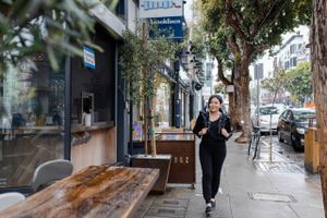 Gloria Felicia, co-founder of Speedify AI and start-up adviser at Spero Studios, takes a walk in the Hayes Valley neighborhood of San Francisco. Photo for The Washington Post by Constanza Hevia H.