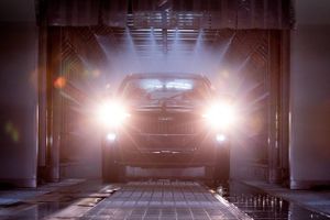 A Haval F7 crossover sport utility vehicle (SUV) drives through a spray machine during a rain simulation test on the assembly line inside the Haval automobile plant, operated by Great Wall Motor Co. Ltd., at the Uzlovaya industrial park, near Tula, Russia, on Monday, Aug. 12, 2019. Incomes in Russia have fallen for five straight years because of the persistently low price of oil, Russia's main export, and the grinding impact of U.S. and European Union sanctions imposed over Crimea. Bloomberg photo by Andrey Rudakov