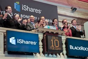 Surrounded by company executives and guests at the New York Stock Exchange, Robert S. Kapito, fifth from left, president of the global investment management company BlackRock. joins the applause during the ringing of the NYSE opening bell to celebrate the 10th anniversary of the creation of the first fixed income exchange traded funds, including iShares, Tuesday, July 10, 2012. Stocks are opening higher after European leaders accelerated a plan to shore up Spain's troubled banks. The Dow Jones industrial average rose 77 points to 12,814 shortly after the start of trading Tuesday. ( AP Photo/Bebeto Matthews)