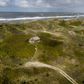 Tyske turister kan godt tage i sommerhus ved f.eks. Vedersø Klit ved Vesterhavet uden, at der sker det store ved det, mener en ekspert. Foto: Casper Dalhoff