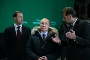 In this photo taken on Tuesday, March 6, 2018, Russian President Vladimir Putin, center, listens to Uralvagonzavod Scientific and Industrial Corporation General Director Alexander Potapov, right, visiting Uralvagonzavod factory as Minister of Industry and Trade Denis Manturov, left, stands behind him in Nizhny Tagil, Russia . President Vladimir Putin has sought to reach out to voters across Russia. Putin has appealed to various social groups and traveled to many of the country’s far-flung regions, promising to bolster the economy, raise living standards and combat poverty. (AP Photo/Alexander Zemlianichenko).