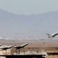 Droner affyret under en militærøvelse et ukendt sted i Iran. De iranske droner har de seneste dage voldt død og ødelæggelse i Ukraine. Arkivfoto: Det iranske militær/West Asia News Agency/Reuters
