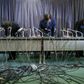 Den øverste ledelse, herunder præsident og driftsdirektør Tetsuro Aikawa (i midten), bekllager Mitsubishis snyd med brændstofforbruget under en pressekonference i Tokyo den 11. maj 2016.