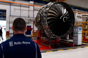 In this file photo taken on November 30, 2016 Rolls Royce Trent XWB engines on view on the assembly line at the Rolls Royce factory in Derby, central England. - Rolls-Royce, the British maker of plane engines, said Wednesday it will cut at least 9, 000 jobs and slash costs elsewhere, as the coronavirus slams the aviation sector. "This is not a crisis of our making. But it is the crisis that we face and we must deal with it, " chief executive Warren East said in a statement announcing that Rolls would cut nearly one-fifth of its global workforce. (Photo by Paul ELLIS / POOL / AFP)