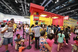 Chinese parents and their children play with Lego toy building bricks at a promotional event by Lego in Tianjin, China, 15 May 2015. Lego and other block toys that offer children a creative experience while they are playing, have been growing in popularity as the country continues its vigorous drive towards greater inventiveness, a quality for which Chinese people have traditionally had little ability. Premier Li Keqiang has been a strong advocate of innovation, a move backed by Jin and many other typical mainland parents. Lego has been quick to recognise the potential of this business opportunity in China and the rest of Asia. A year ago the company began work in Zhejiang province on building its third-largest global factory in the city of Jiaxing, 100km from its China office in Shanghai, which was opened last year. The factory will supply Lego products not only for the China market but also other Asian markets including Japan and South Korea. Trangbaek said it would eventually employ up to 1,500 workers and was due to start packaging Lego toys produced abroad for sale on the mainland later this year. It is due to become fully operational in 2017. Lego also expects to open more than 80 mainland stores by the end of this year, some of which will be based in second- or third-tier cities.(Imaginechina via AP Images)
