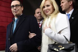  In this Friday, Jan. 20, 2017, file photo, Treasury Secretary-designate Stephen Mnuchin and his fiancee, Louise Linton, arrive on Capitol Hill in Washington, for the presidential inauguration of Donald Trump. Mnuchin and Linton are to be married Saturday, June 24, 2017. (Saul Loeb/Pool Photo via AP, File)