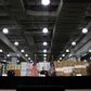 New York Governor Andrew Cuomo speaks in front of stacks of medical protective supplies during a news conference at the Jacob K. Javits Convention Center which will be partially converted into a temporary hospital during the outbreak of the coronavirus disease (COVID-19) in New York City, New York, U.S., March 24, 2020. REUTERS/Mike Segar