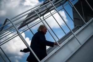 Former president Donald Trump boards his airplane, known as Trump Force One, en route to Iowa at Palm Beach International Airport on March 13. Washington Post photo by Jabin Botsford