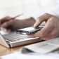 Det tog 20 år fra den personlige computer blev opfundet til den løftede produktiviteten. Arkivfoto: Fancy/Veer/Corbis