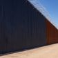 Trumps grænsemur – her på Californiens grænse til Mexico nær Calexico – er højere end andre grænsemure og dyrere. Foto: CBP