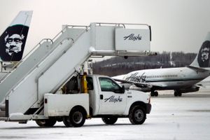 Alaska Airlines vil gøre det endnu hurtige at aflevere sine kufferter ved hjælp af printede baggage tags og elektronisk indcheckning hjemmefra. Foto: Al Grillo/AP