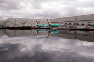 Boeing 737 MAX model jets are parked at the back of Boeing's production facility adjacent to the south end of Lake Washington Monday, April 8, 2019, in Renton, Wash. (AP Photo/Elaine Thompson)