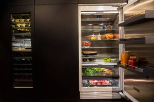 
IMAGE DISTRIBUTED FOR BSH HOME APPLIANCES - At KBIS 2018, Gaggenau unveils the new 400 cooling series - a fully integrated, built-in modular range of refrigerators, freezers, and wine climate units - on Tues., Jan. 9, 2018 in Orlando, Fla. Equipped with push-to-open technology, the new cooling series allows for the first-ever truly handless kitchen when paired with the brand's 400 series appliances. Inspired by grand architectural structures, the 400 cooling series has been designed for those who appreciate the aesthetically advanced. Combining modularity with the smooth lines of seamless integration, these sculpted appliances redefine the landscape of the functional kitchen. (Willie J. Allen Jr./AP Images for BSH Home Appliances)