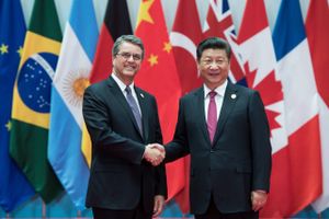Kinas præsident Xi Jinping tager imod WTO's generaldirektør. Det gør USA's præsident Trump ikke. Foto: AP