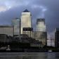 No. 1 Canada Square, center, stands with skyscrapers housing the offices of HSBC Holdings Plc, Citigroup Inc., and Barclays Plc, in the Canary Wharf business, financial and shopping district on the banks of the River Thames in London, U.K., on Thursday, Sept. 19, 2013. Britain's budget deficit narrowed in August as tax income rose and the government cut spending, providing further evidence that the recovery is taking hold. Photographer: Matthew Lloyd/Bloomberg