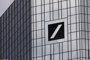 The Deutsche Bank logo sits on the bank's headquarters in Frankfurt on July 25, 2018. MUST CREDIT: Bloomberg photo by Alex Kraus.