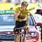 Jumbo-Visma team's Danish rider Jonas Vingegaard wearing the overall leader's yellow jersey celebrates as he cycles to the finish line to win the 18th stage of the 109th edition of the Tour de France cycling race, 143, 2 km between Lourdes and Hautacam in the Pyrenees mountains in southwestern France, on July 21, 2022. (Photo by Marco BERTORELLO / AFP)